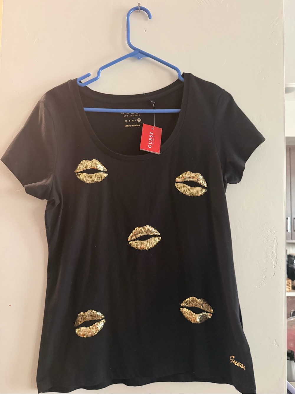 GUESS Black Short-Sleeve Tee with Gold Sequin Lip Appliqués